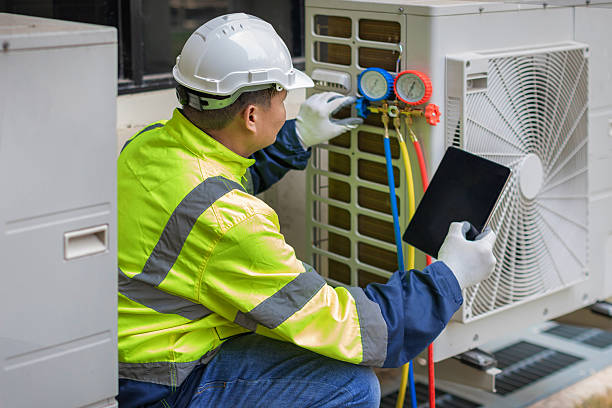 Professional Heat Pump Repair technician working in Vernon, NY